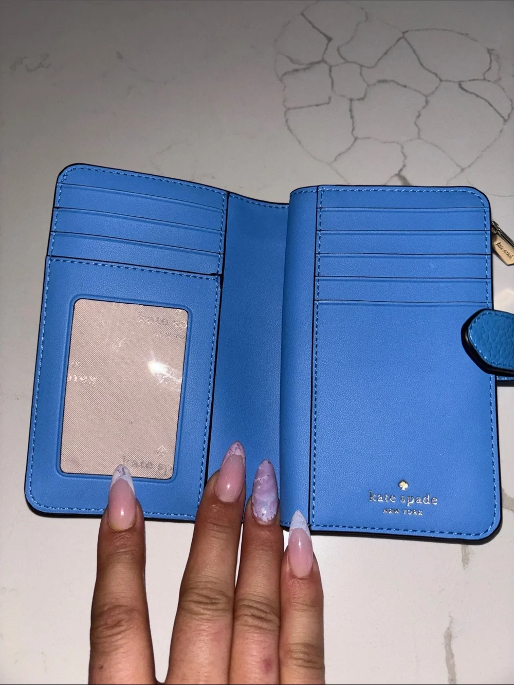 kate spade pebble leather zip wallet in bright blue
